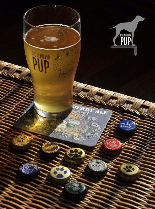 Intrepid Pup pint glass and bottle caps from dog-inspired brews