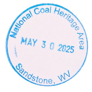 Blue circular inked stamp for National Coal Heritage Area