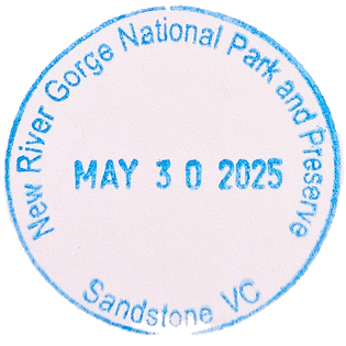 Blue circular inked stamp for New River Gorge National Park and Preserve - Sandstone Visitor Center